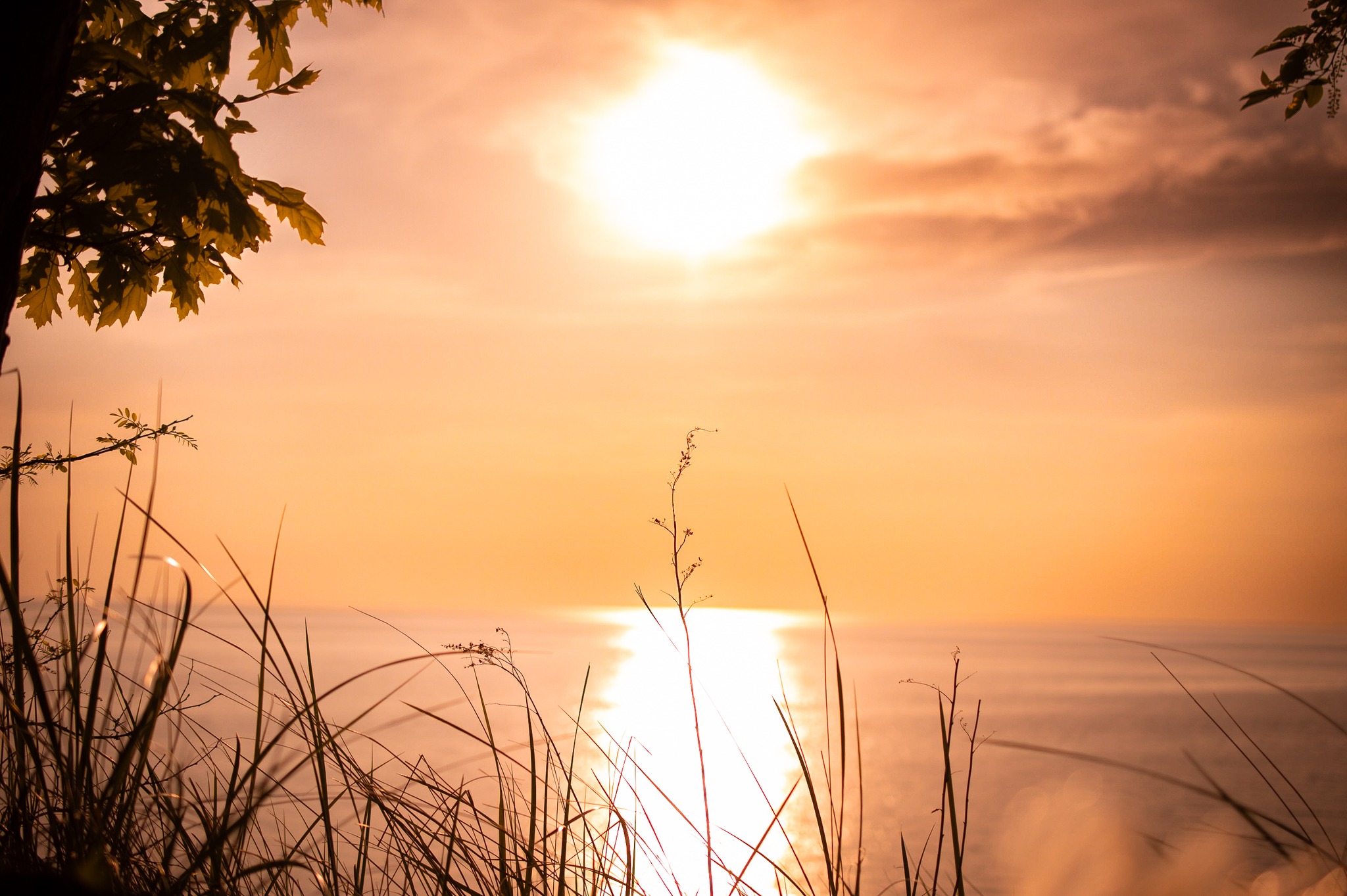 A transient image of Lake Michigan at sunset.