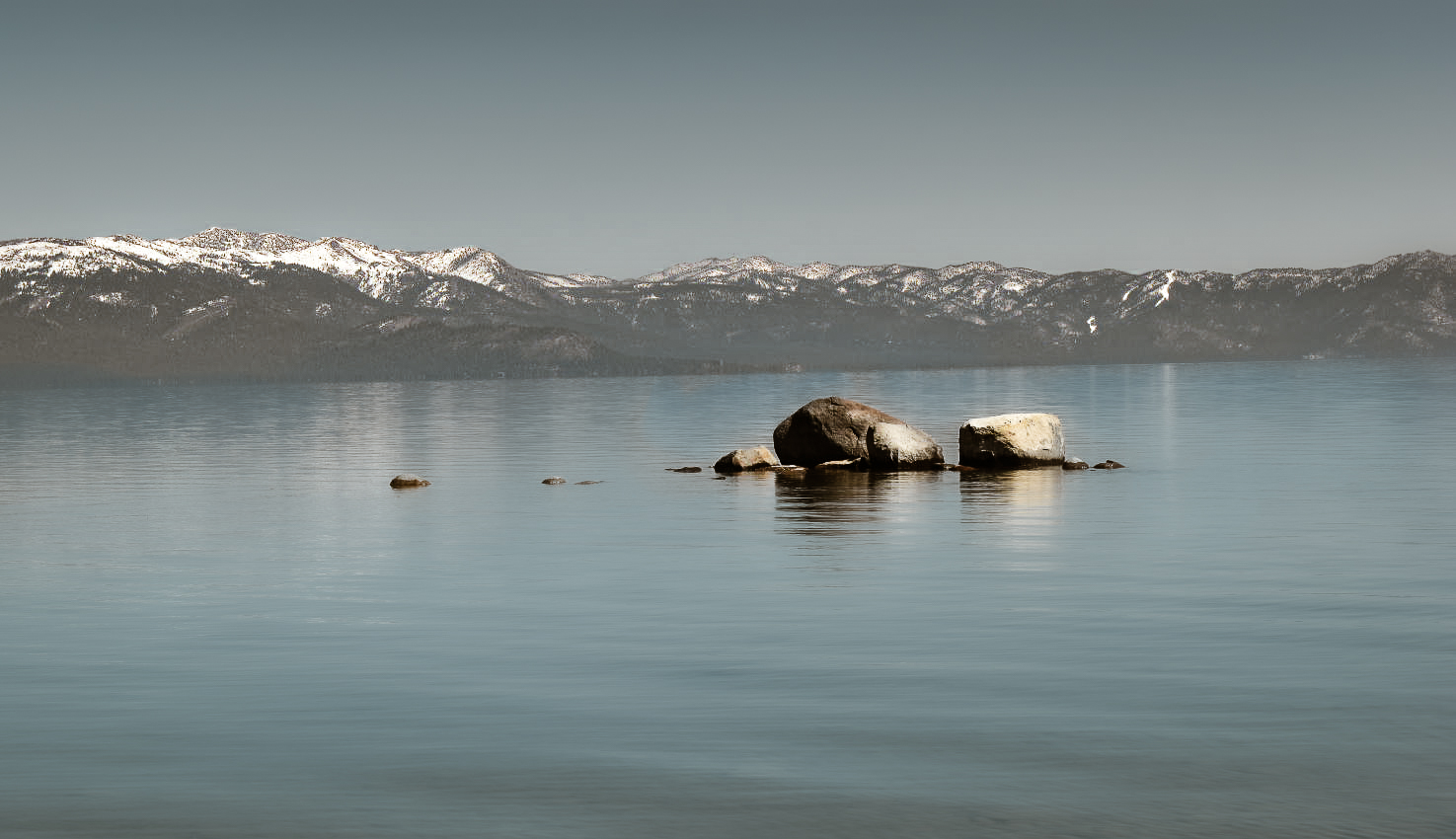 Rocks are visible on Lake Tahoe.