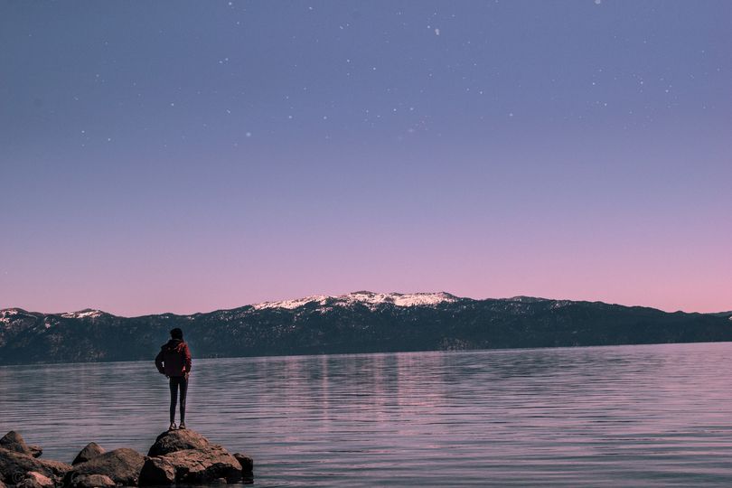 A woman astonished by the view of Lake Tahoe.