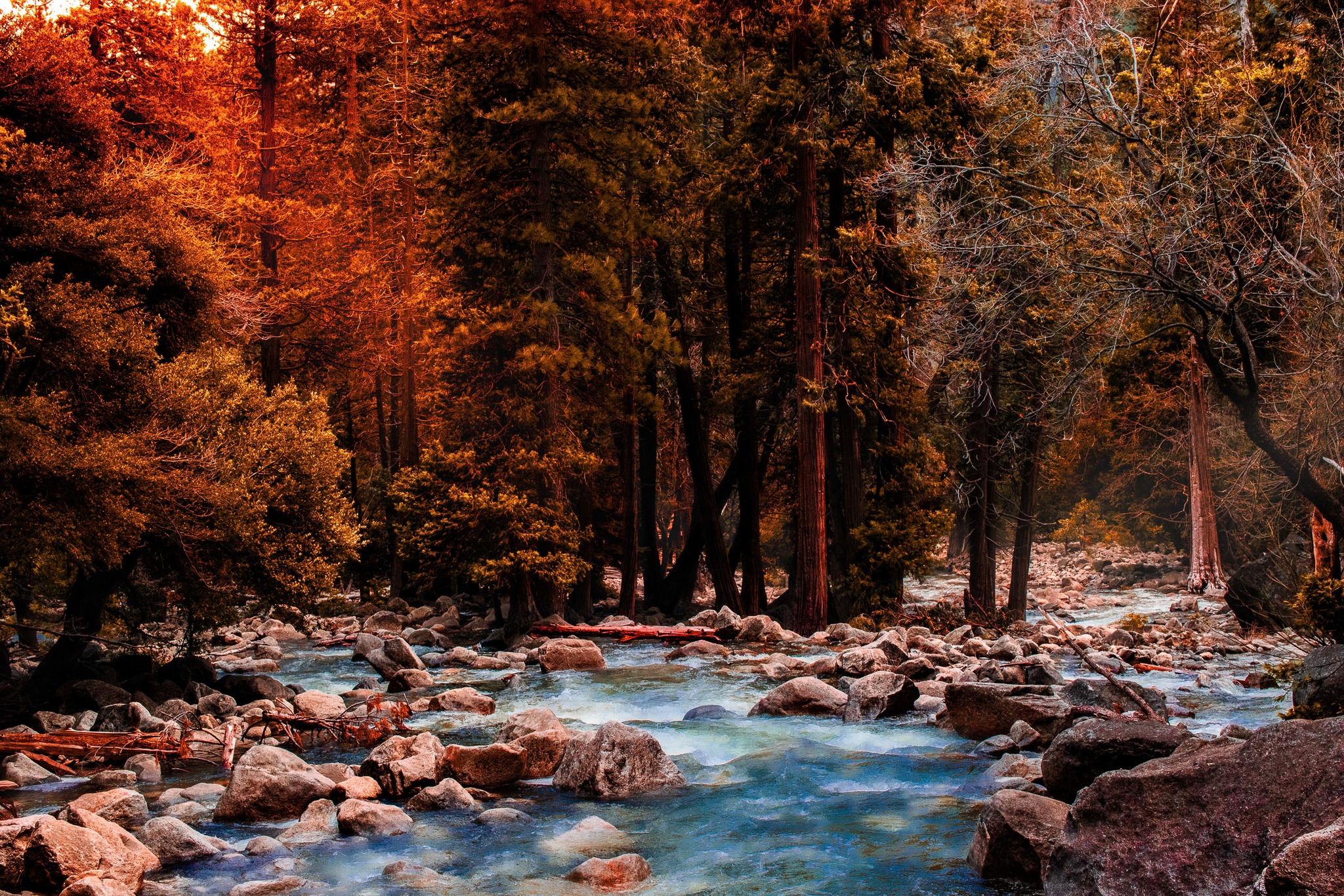 A river runs off of Yosemite Falls.